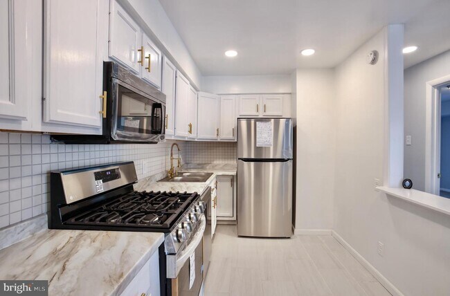 2303 Olson St-Unit -103 in Hillcrest Heights, MD - Building Photo - Building Photo