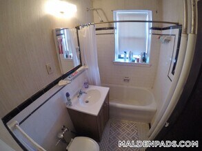 349 Pleasant St, Unit B1-11 in Malden, MA - Building Photo - Building Photo