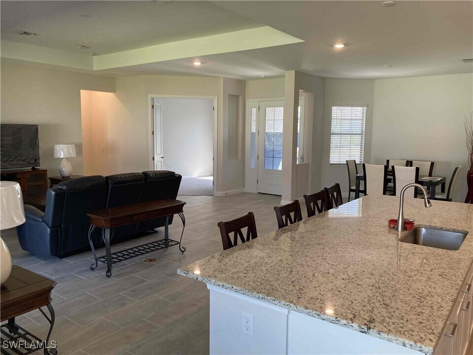 11717 Canopy Loop in Miromar Lakes, FL - Building Photo