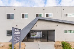 La Pat Courtyard Apartments in Westminster, CA - Building Photo