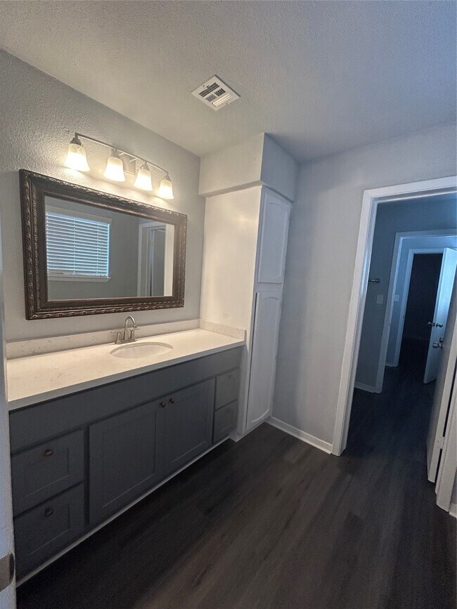 property at 11411 Harwin Dr.