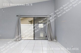 3331 Whispering Dr N in Largo, FL - Building Photo - Building Photo