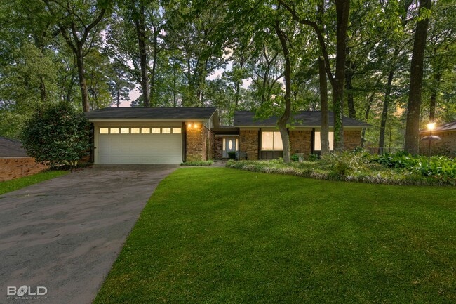 property at 8718 Woodstock Dr