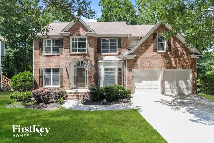 1557 Grove Arbor Terrace in Dacula, GA - Foto de edificio