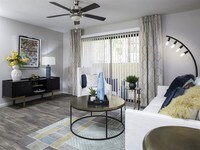 Select homes feature wood-look flooring in the living spaces - Lore South Mountain Apartments in Phoenix, Arizona