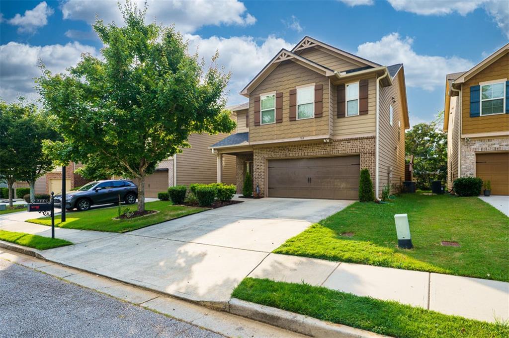 728 Sweet Ashley Way in Loganville, GA - Building Photo