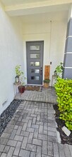 4971 Whispering Way in Fort Lauderdale, FL - Building Photo - Building Photo