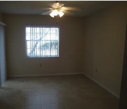 2831 N Oakland Forest Dr, Unit 208 in Oakland Park, FL - Building Photo - Building Photo