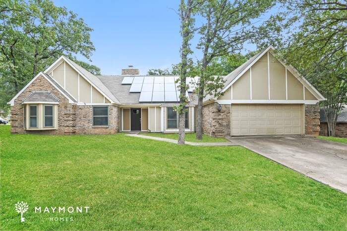 1009 Woodridge Dr in Azle, TX - Building Photo