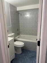 13211 11th Ave, Unit 1 in College Point, NY - Building Photo - Building Photo