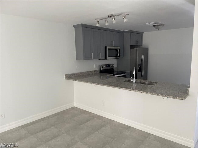 1114 Capetown Ave in Lehigh Acres, FL - Building Photo - Building Photo