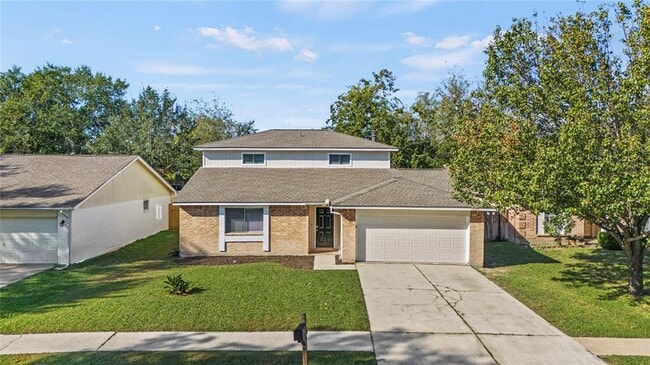 property at 7519 Wovenwood Ln