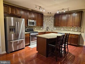 15234 TORBAY Way in Woodbridge, VA - Building Photo