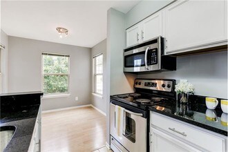 11653 Gas Light Ct-Unit -E in Reston, VA - Building Photo - Building Photo