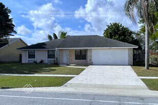 112 La Mancha Ave in Royal Palm Beach, FL - Building Photo