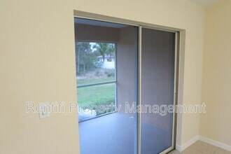 1562 Gilbert Ave S in Lehigh Acres, FL - Building Photo - Building Photo