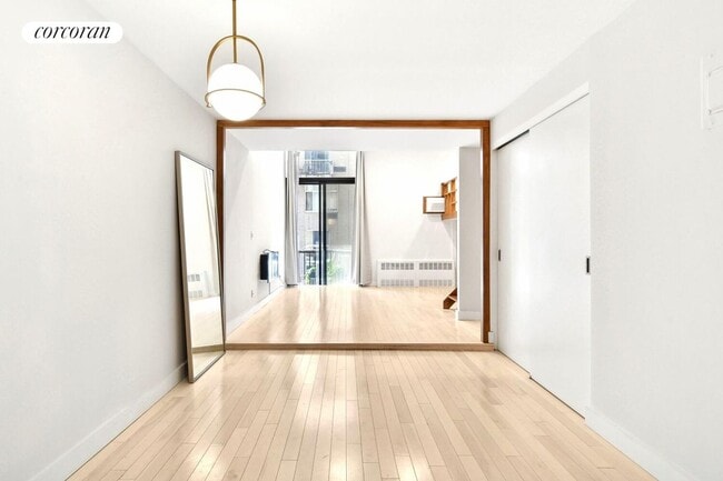 property at 215 E 24th St