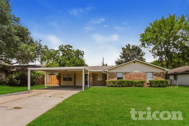 property at 411 E Carby Rd