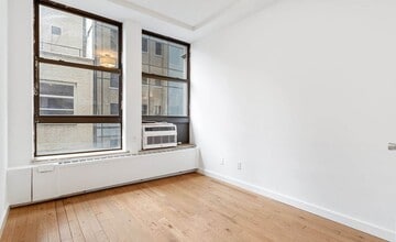 102 Fulton St in New York, NY - Building Photo - Building Photo