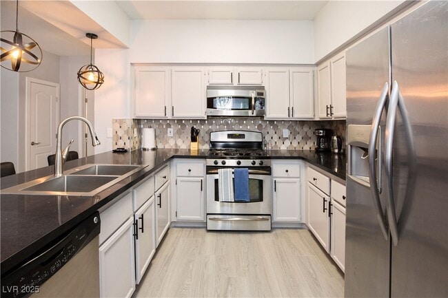 7705 Himalayas Ave in Las Vegas, NV - Building Photo - Building Photo