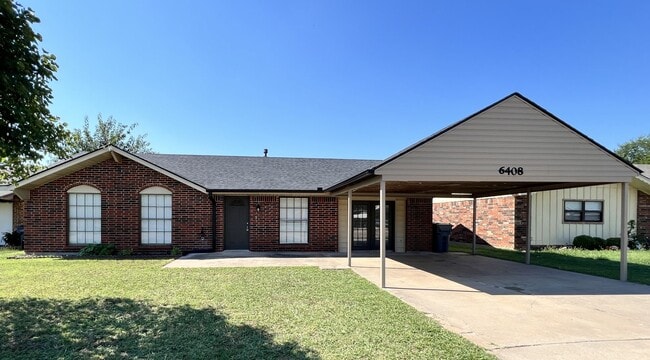 property at 6408 NW Oak Ave