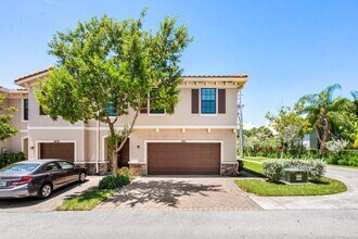 4111 Plum Tree Ln in Riviera Beach, FL - Building Photo - Building Photo