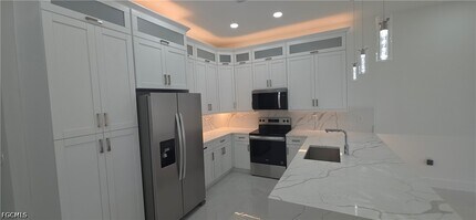 322-324 Poplar St in Lehigh Acres, FL - Building Photo - Building Photo