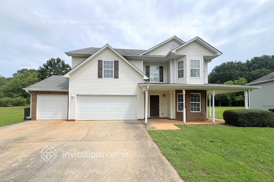 1245 Mills Cove Dr in Covington, GA - Building Photo