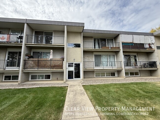 property at 220 Mayor Magrath Dr N
