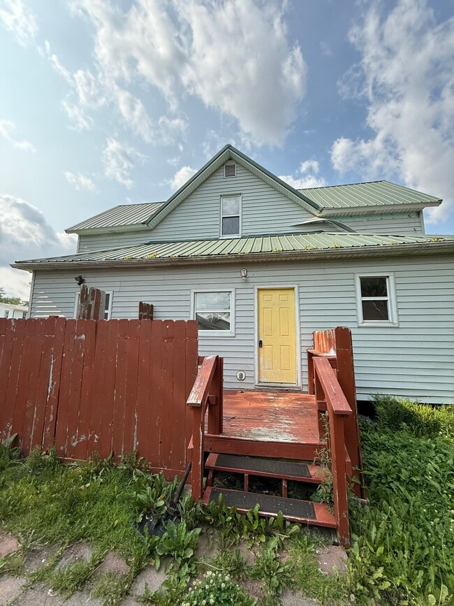 property at 26 E 1st St