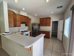 10409 Calypso Cave St in Las Vegas, NV - Foto de edificio - Building Photo