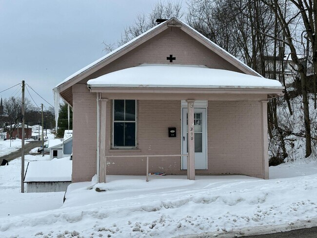 property at 210 E 7th St