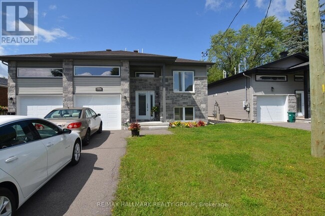 property at 8009 Jeanne D'Arc Blvd N