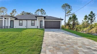 704 Homer Ave S in Lehigh Acres, FL - Building Photo