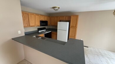 4200 Chesapeake Cir in Wolverine Lake, MI - Building Photo - Building Photo