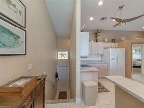 25073 Peacock Ln-Unit -201 in Naples, FL - Building Photo - Building Photo