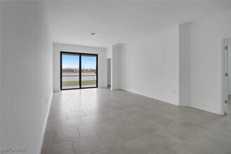 19529 Hinkley Dr in Estero, FL - Building Photo - Building Photo