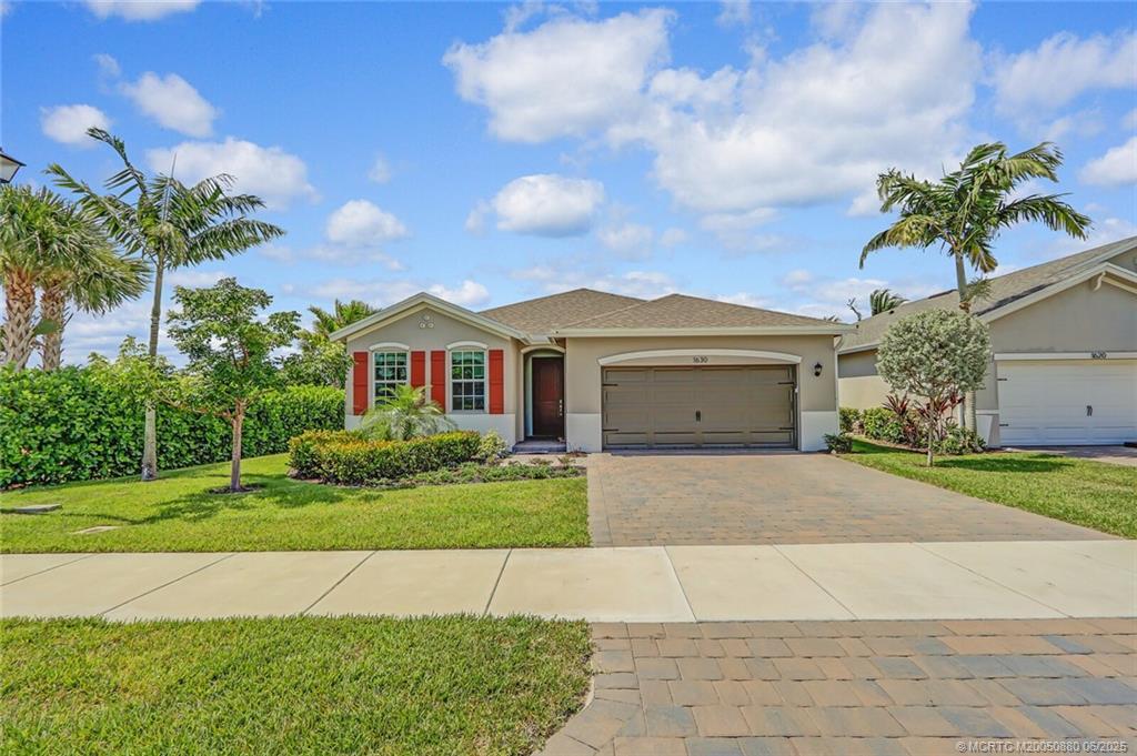 1630 NE Skyhigh Ter in Ocean Breeze, FL - Foto de edificio