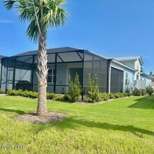 9037 Parrot Pl in Panama City Beach, FL - Building Photo - Building Photo