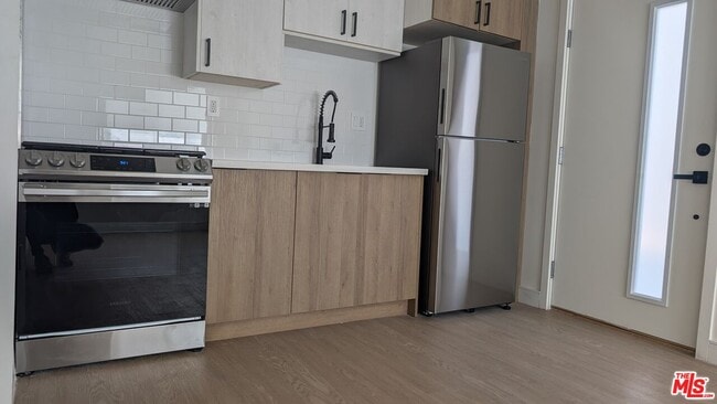 1125 Lodi Pl in Los Angeles, CA - Building Photo - Building Photo