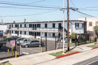 8711-8717 Avalon Blvd in Los Angeles, CA - Building Photo - Building Photo