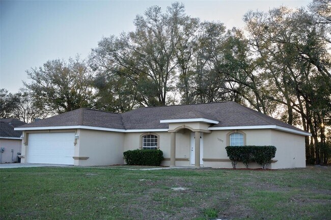 property at 13700 SW 48th Ct