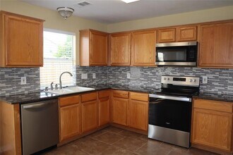 11735 Rolling Stream Dr in Tomball, TX - Building Photo - Building Photo