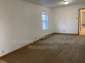 1557 W Jefferson St in Laramie, WY - Building Photo - Building Photo