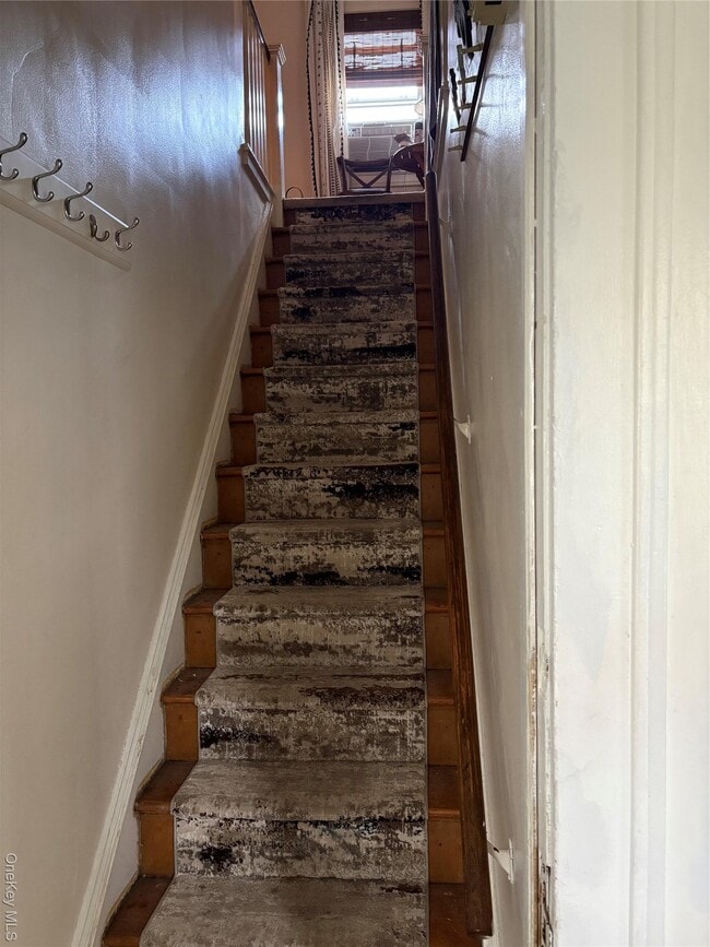 property at 38-30 210th St