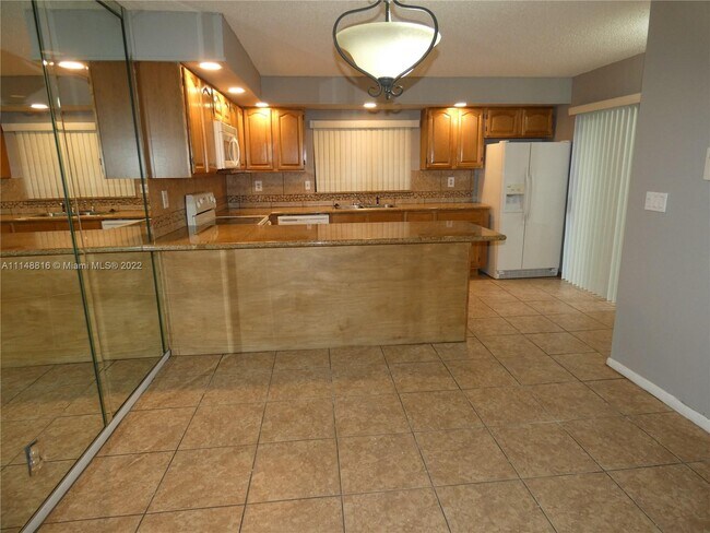 5819 Swordfish Ct-Unit -A in Tamarac, FL - Building Photo - Building Photo