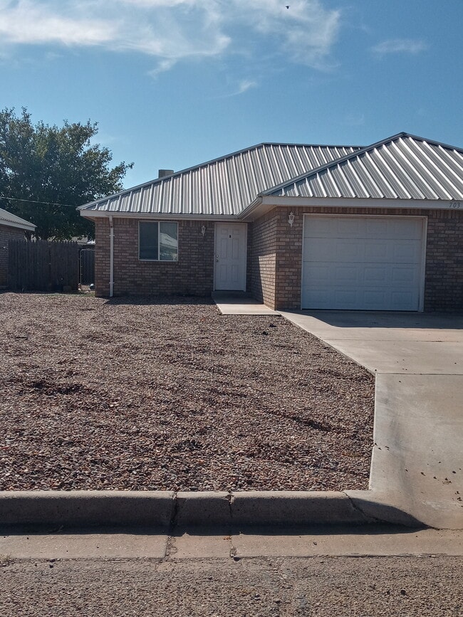 property at 703 Ave C S