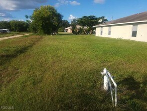1122 Harry Ave S in Lehigh Acres, FL - Building Photo - Building Photo