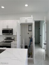 1037 Macy St E in Lehigh Acres, FL - Building Photo - Building Photo