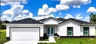 825 Porter St E in Lehigh Acres, FL - Building Photo